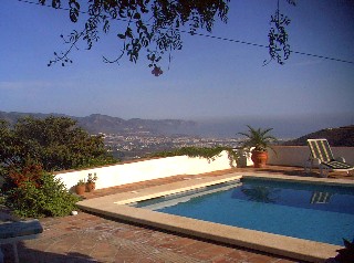 the private pool with sunny terrace and sea views