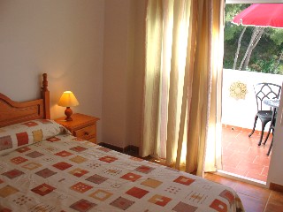 Die Schlafzimmer in den Appartements verf�gen �ber Doppelbetten und Einzelbetten