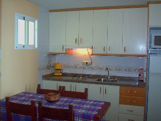 Die K�che mit Esstisch im Appartement Antonio 